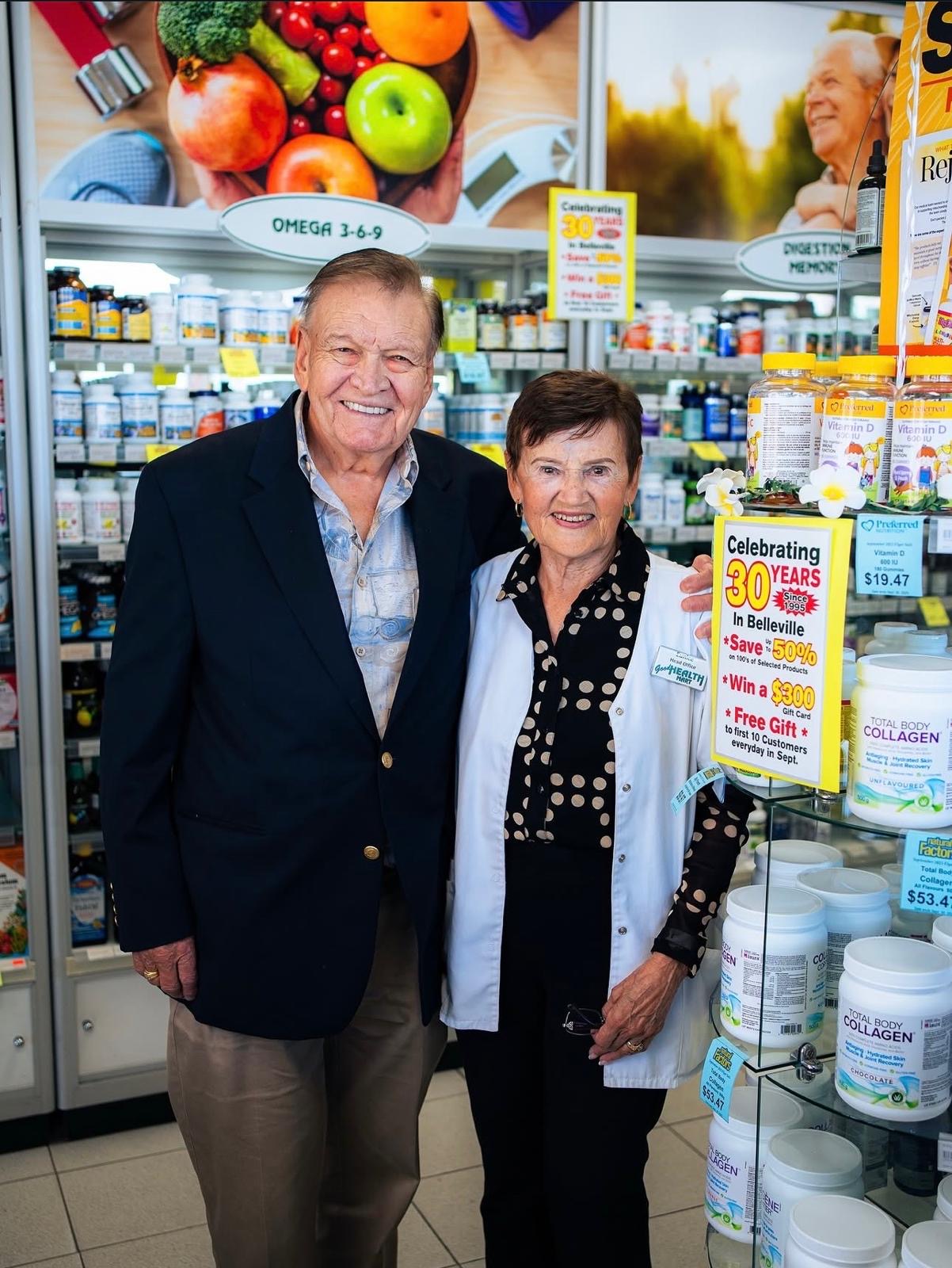Founders Murray and Eunice McMahon inside a Good Health Mart store